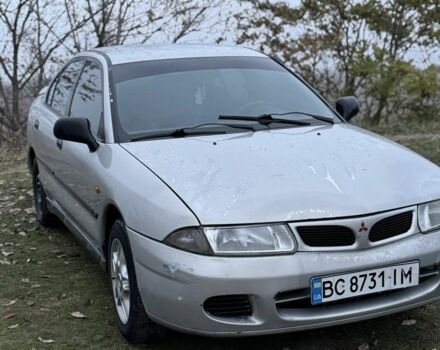 Серый Мицубиси Харизма, объемом двигателя 1.6 л и пробегом 340 тыс. км за 2000 $, фото 2 на Automoto.ua