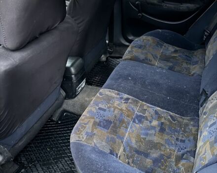 Серый Мицубиси Харизма, объемом двигателя 1.6 л и пробегом 340 тыс. км за 2000 $, фото 5 на Automoto.ua