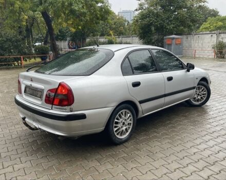 Сірий Міцубісі Харизма, об'ємом двигуна 1.9 л та пробігом 400 тис. км за 2800 $, фото 4 на Automoto.ua