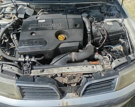 Серый Мицубиси Харизма, объемом двигателя 0 л и пробегом 487 тыс. км за 728 $, фото 1 на Automoto.ua