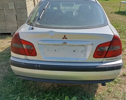 Серый Мицубиси Харизма, объемом двигателя 0 л и пробегом 487 тыс. км за 728 $, фото 5 на Automoto.ua