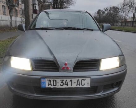 Сірий Міцубісі Харизма, об'ємом двигуна 1.8 л та пробігом 379 тис. км за 1307 $, фото 3 на Automoto.ua