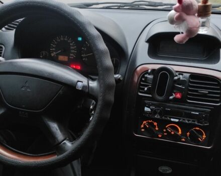 Сірий Міцубісі Харизма, об'ємом двигуна 1.8 л та пробігом 379 тис. км за 1307 $, фото 6 на Automoto.ua