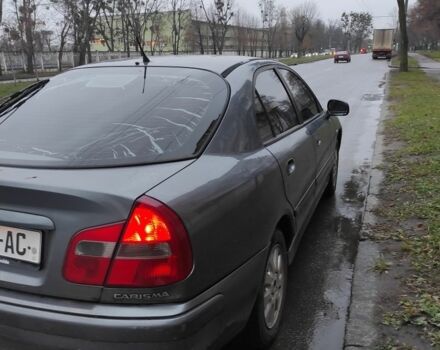 Сірий Міцубісі Харизма, об'ємом двигуна 1.8 л та пробігом 379 тис. км за 1307 $, фото 1 на Automoto.ua