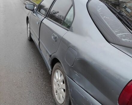 Сірий Міцубісі Харизма, об'ємом двигуна 1.8 л та пробігом 379 тис. км за 1307 $, фото 4 на Automoto.ua