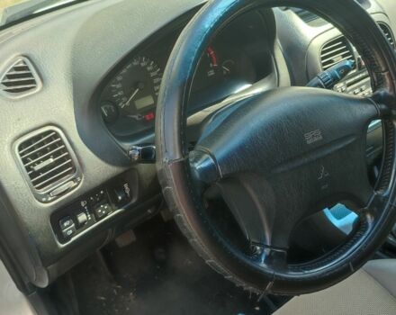 Мицубиси Харизма 2002 в Кривом Роге на Automoto.ua Серый Мицубиси Харизма, объемом двигателя 1.8 л и пробегом 287 тыс. км за 3300 $, фото 2 на Automoto.ua