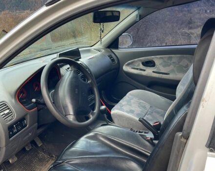 Серый Мицубиси Харизма, объемом двигателя 1.6 л и пробегом 270 тыс. км за 750 $, фото 5 на Automoto.ua