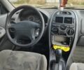 Сірий Міцубісі Харизма, об'ємом двигуна 1.6 л та пробігом 264 тис. км за 70000 $, фото 3 на Automoto.ua