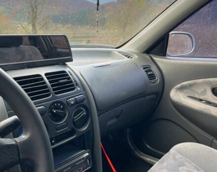 Серый Мицубиси Харизма, объемом двигателя 1.6 л и пробегом 270 тыс. км за 750 $, фото 2 на Automoto.ua