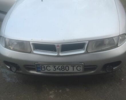 Серый Мицубиси Харизма, объемом двигателя 1.9 л и пробегом 280 тыс. км за 1200 $, фото 1 на Automoto.ua