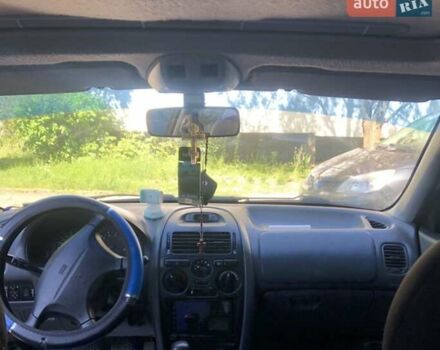 Серый Мицубиси Харизма, объемом двигателя 1.6 л и пробегом 260 тыс. км за 2000 $, фото 1 на Automoto.ua