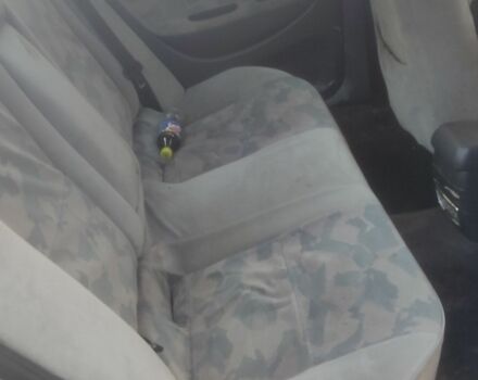 Серый Мицубиси Харизма, объемом двигателя 1.9 л и пробегом 280 тыс. км за 1200 $, фото 3 на Automoto.ua