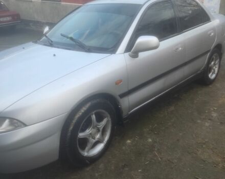 Серый Мицубиси Харизма, объемом двигателя 1.9 л и пробегом 280 тыс. км за 1200 $, фото 5 на Automoto.ua