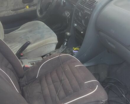 Серый Мицубиси Харизма, объемом двигателя 1.9 л и пробегом 280 тыс. км за 1200 $, фото 2 на Automoto.ua