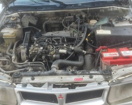 Серый Мицубиси Харизма, объемом двигателя 1.9 л и пробегом 280 тыс. км за 1200 $, фото 7 на Automoto.ua