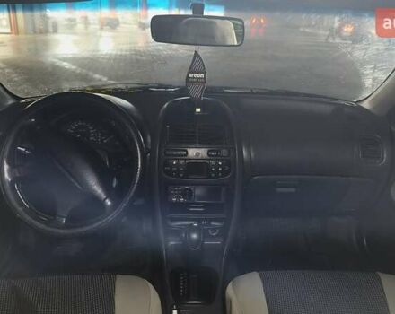 Серый Мицубиси Харизма, объемом двигателя 1.83 л и пробегом 350 тыс. км за 1500 $, фото 6 на Automoto.ua