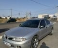 Серый Мицубиси Харизма, объемом двигателя 1.8 л и пробегом 400 тыс. км за 2350 $, фото 1 на Automoto.ua