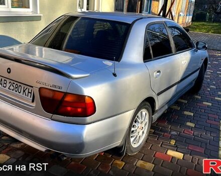 Сірий Міцубісі Харизма, об'ємом двигуна 1.8 л та пробігом 296 тис. км за 1600 $, фото 4 на Automoto.ua