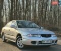 Сірий Міцубісі Харизма, об'ємом двигуна 1.83 л та пробігом 350 тис. км за 1499 $, фото 10 на Automoto.ua