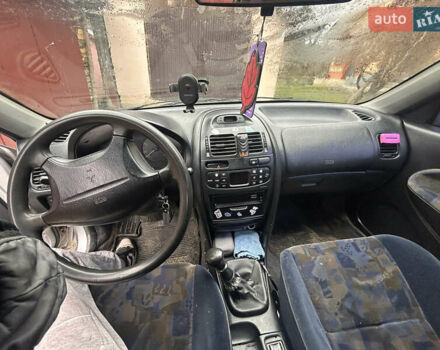 Сірий Міцубісі Харизма, об'ємом двигуна 1.9 л та пробігом 368 тис. км за 1000 $, фото 7 на Automoto.ua