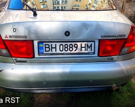 Серый Мицубиси Харизма, объемом двигателя 1.8 л и пробегом 320 тыс. км за 1600 $, фото 1 на Automoto.ua