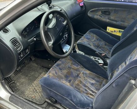 Сірий Міцубісі Харизма, об'ємом двигуна 1.9 л та пробігом 350 тис. км за 1000 $, фото 5 на Automoto.ua