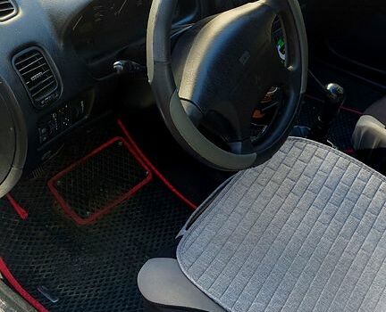 Серый Мицубиси Харизма, объемом двигателя 1.8 л и пробегом 320 тыс. км за 1600 $, фото 6 на Automoto.ua