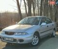 Сірий Міцубісі Харизма, об'ємом двигуна 1.83 л та пробігом 350 тис. км за 1499 $, фото 4 на Automoto.ua