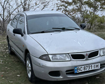 Серый Мицубиси Харизма, объемом двигателя 1.6 л и пробегом 340 тыс. км за 2000 $, фото 2 на Automoto.ua