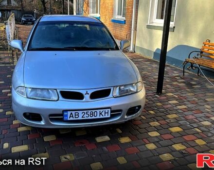 Сірий Міцубісі Харизма, об'ємом двигуна 1.8 л та пробігом 296 тис. км за 1600 $, фото 7 на Automoto.ua