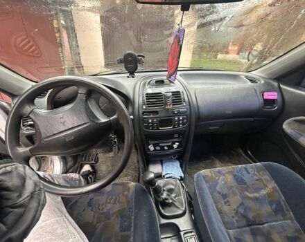 Сірий Міцубісі Харизма, об'ємом двигуна 1.9 л та пробігом 350 тис. км за 1000 $, фото 7 на Automoto.ua