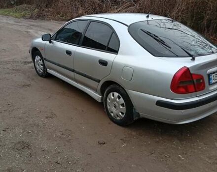 Серый Мицубиси Харизма, объемом двигателя 1.6 л и пробегом 320 тыс. км за 3000 $, фото 2 на Automoto.ua