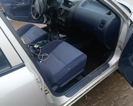 Серый Мицубиси Харизма, объемом двигателя 1.9 л и пробегом 280 тыс. км за 700 $, фото 4 на Automoto.ua