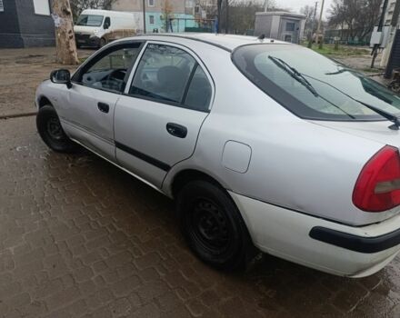 Серый Мицубиси Харизма, объемом двигателя 1.9 л и пробегом 280 тыс. км за 700 $, фото 5 на Automoto.ua