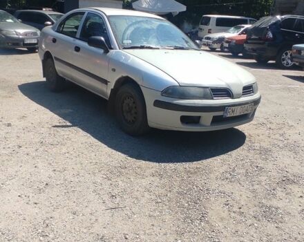 Сірий Міцубісі Харизма, об'ємом двигуна 1.9 л та пробігом 250 тис. км за 800 $, фото 1 на Automoto.ua