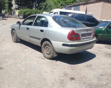 Сірий Міцубісі Харизма, об'ємом двигуна 1.9 л та пробігом 250 тис. км за 800 $, фото 3 на Automoto.ua