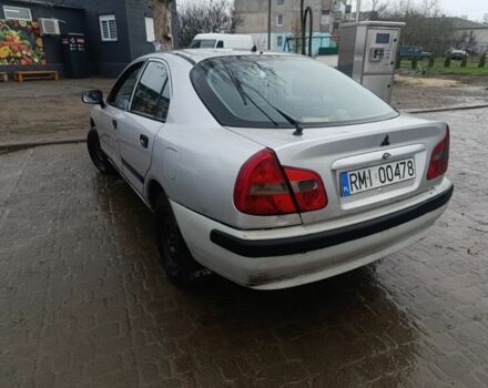 Серый Мицубиси Харизма, объемом двигателя 1.9 л и пробегом 280 тыс. км за 700 $, фото 1 на Automoto.ua