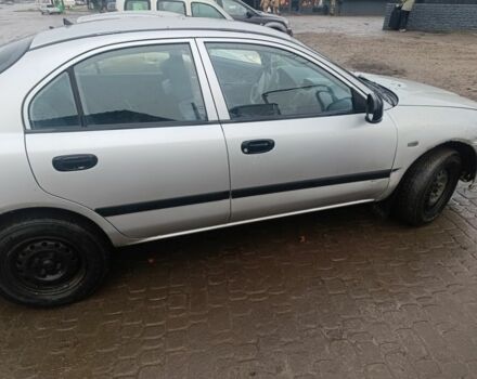 Серый Мицубиси Харизма, объемом двигателя 1.9 л и пробегом 280 тыс. км за 700 $, фото 3 на Automoto.ua