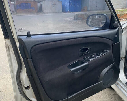 Сірий Міцубісі Харизма, об'ємом двигуна 1.83 л та пробігом 265 тис. км за 2850 $, фото 13 на Automoto.ua