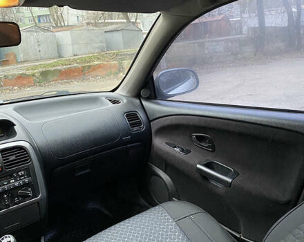 Сірий Міцубісі Харизма, об'ємом двигуна 1.83 л та пробігом 265 тис. км за 2850 $, фото 16 на Automoto.ua