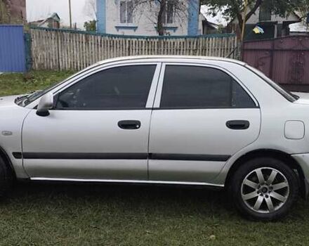 Серый Мицубиси Харизма, объемом двигателя 1.6 л и пробегом 250 тыс. км за 2600 $, фото 7 на Automoto.ua