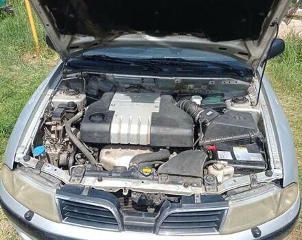 Серый Мицубиси Харизма, объемом двигателя 1.8 л и пробегом 416 тыс. км за 2800 $, фото 20 на Automoto.ua