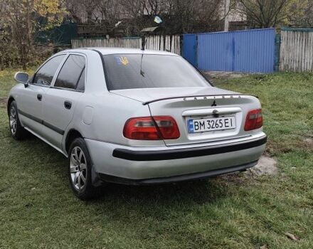 Серый Мицубиси Харизма, объемом двигателя 1.6 л и пробегом 250 тыс. км за 2600 $, фото 5 на Automoto.ua