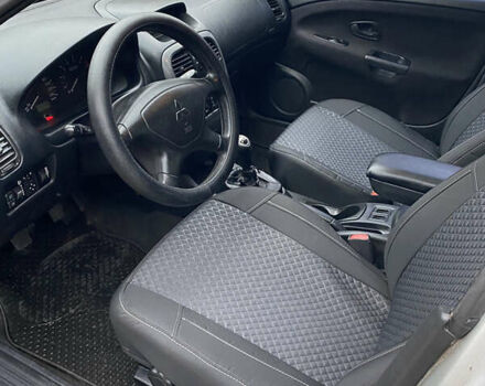 Сірий Міцубісі Харизма, об'ємом двигуна 1.83 л та пробігом 265 тис. км за 2850 $, фото 14 на Automoto.ua