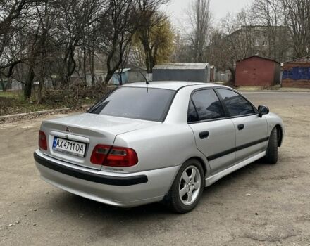 Серый Мицубиси Харизма, объемом двигателя 1.8 л и пробегом 265 тыс. км за 2850 $, фото 3 на Automoto.ua