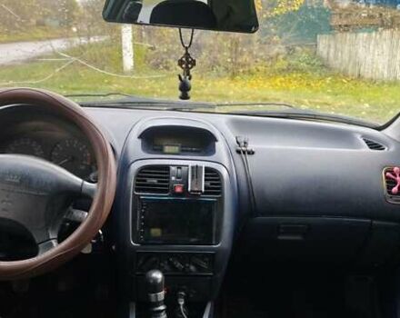 Серый Мицубиси Харизма, объемом двигателя 1.6 л и пробегом 250 тыс. км за 2600 $, фото 12 на Automoto.ua