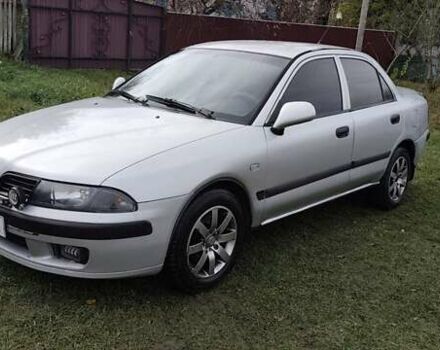 Серый Мицубиси Харизма, объемом двигателя 1.6 л и пробегом 250 тыс. км за 2600 $, фото 3 на Automoto.ua