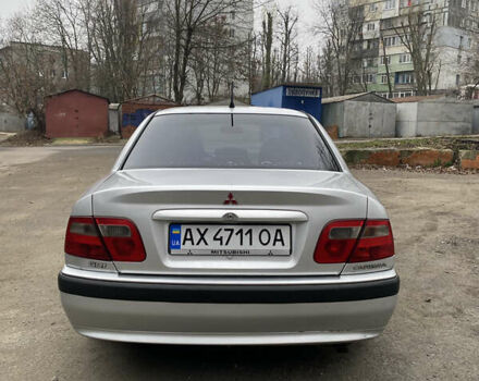 Сірий Міцубісі Харизма, об'ємом двигуна 1.83 л та пробігом 265 тис. км за 2850 $, фото 5 на Automoto.ua