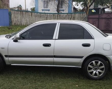 Серый Мицубиси Харизма, объемом двигателя 1.6 л и пробегом 250 тыс. км за 2600 $, фото 6 на Automoto.ua