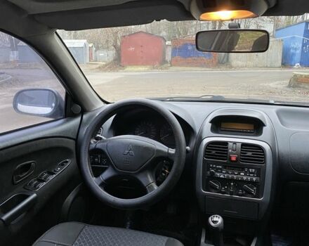 Серый Мицубиси Харизма, объемом двигателя 1.8 л и пробегом 265 тыс. км за 2850 $, фото 15 на Automoto.ua